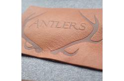 China Customized Hot Stamped Antique Copper Embossed Leather Patches supplier