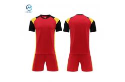 China Custom Team Jersey Dynamic Soccer Kits with Bold Stripes Fade-Resistant Ink supplier