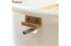 China 2 frame plastic manual honey processing extraction machine beekeeping honey extractor supplier