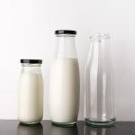 Silk Screen 25Oz 32Oz Milk Packaging Glass Bottle With Metal Lid Beverage Bottle for sale