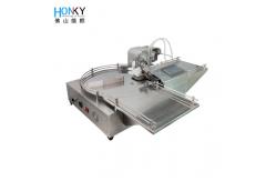 China Cosmetic Industry Essential Oil Desktop Filling Machine With Ceramic Pump supplier