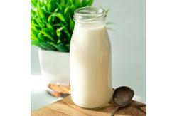 China In Stock 1000Ml 750Ml Portable Juice Milk Glass Bottles With Lid supplier