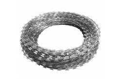 China 450mm Coil Diameter Galvanized Razor Barbed Wire For Mesh Fence supplier