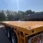 China 20ft 40ft Container Flatbed Truck Semi Trailer with 3mm 4mm Grain Plate Platform factory
