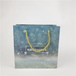 Best Selling Recyclable Environmental Friendly Logo Printed Shopping Paper Bag Packaging White 110 Gram Reusable for sale