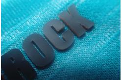China Ironed Onto Garments Custom Cloth Badges , Embossed TPU Labels supplier