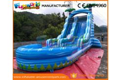 China 0.55mm PVC Tarpaulin Commercial Inflatable Slide Blue Palm Tree Slide With Pool supplier