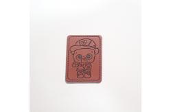 China Debossed Logo Small PU Leather Patches suitable For Hat And Bag supplier