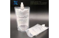 China Custom Printed Plastic Placing Single Clear Stand Up Pouch Liquid Bags With Spout supplier