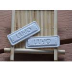 Degradable 2mm garment TPU Clothing Labels With Mould Embossed Logo for sale