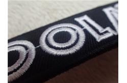 China Black Twill White Line Custom Embroidered Patches With Stylish Backing Hot Melt Adhesive supplier