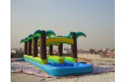 China 11.3m Long Inflatable Slide With Palm Trees Theme supplier