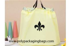 China Gravure Printing 0.07mm Thickness LDPE Plastic Drawstring Shoes Packaging Bags With Handle supplier