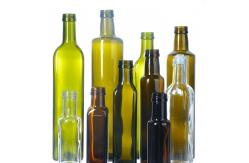 China In Stock 250Ml 500Ml 750Ml Round Glass Oil Bottles With Lid supplier
