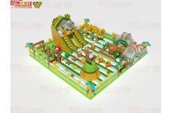 China Green Style Inflatable Fun Park With Ocstacles Slides For Kids supplier