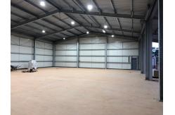 China 100% Recycled Steel Structure Building Warehouse With Flexible Layout supplier