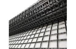 China 100-100KN/M Bitumen Coated Fiberglass Geogrid Asphalt Pavement Reinforcement Geogrid supplier
