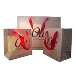 Custom Printed White Paper Gift Bags Wholesale Spot UV Logo Ribbon Handle for sale
