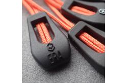 China Durable Embossed Logo PVC Zipper Slider Puller supplier