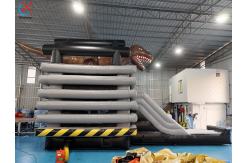 China New Design Inflatable Bounce Castle With Slide Commercial Dinosaur Theme supplier
