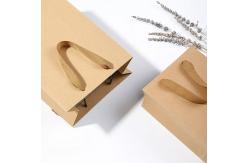China Handbag Kraft Paper Bag / Gift Bag Recyclable Drawstring Handle supplier