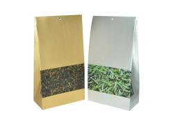 China Yellow Silvery Matte Finish Plastic Packaging Bag With Square Bpttom For Tea supplier