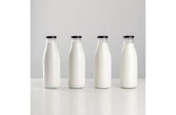 China 200Ml 250Ml 500Ml Transparent Clear Iced Drinks Milk Glass Bottles With Lid supplier