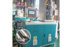 China Automated PVC Door Gasket Production Line with Online Magnetic Strip Inserting Device and PLC Control System for 45° Precision Angle Cutting supplier