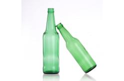 China Empty Amber Green Alcohol Glass Beer Bottles with Crown Caps supplier