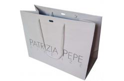 China Large White Kraft Paper Customized Paper Bags With Hole In The Center supplier