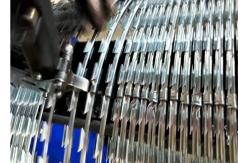 China Cbt 65 Electric Galvanized Razor Barbed Wire With High Security Protection supplier