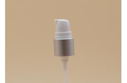 China 18mm Cosmetic Treatment Pumps Matt Silver Closure White PP Half Cap supplier