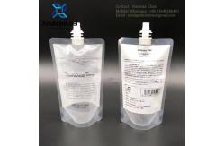 China Custom Printed Plastic Placing Single Clear Stand Up Pouch Liquid Bags With Spout supplier