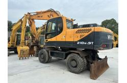 China Hyundai 210W-9T Used Wheel Excavator 22T With Cummins Engine 140kW supplier