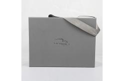 China Luxury Silver Folding Gift Box Custom Foil Stamping Logo With Ribbon Handle supplier