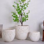 neutral beige round fiber clay planter with honeycomb structure pattern lightweight durable low-maintainence flower pot holiday Villa hotel shopping mall office decoration garden landscaping project for sale