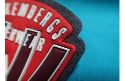China Custom Logo Embossed Self Adhesive Clothing Patches , Silicone 3D Rubber Labels supplier
