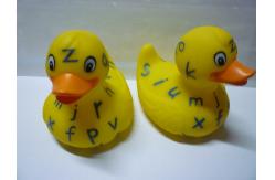 China Phthalate Free Letter Printed Weighted Rubber Ducks Toy With Camouflage Design supplier