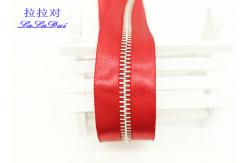 China High End High Polished Metal Separating Zipper Red Tape Customized For Coveralls supplier