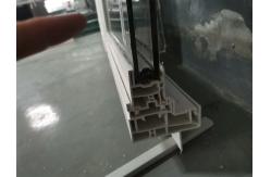 China Windproof White UPVC Single Hung Window With Grill And Mesh supplier