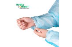 China Blue/White Waterproof Disposable PP PE Medical Isolation Gown With Blue Tape supplier