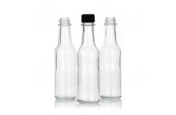 China 150ml Round 5oz Hot Sauce Bottles Glass Seasoning Bottle supplier