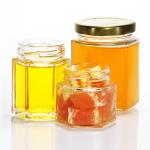 Customized Shape 250ml 300ml 400ml 500ml Hexagonal Shape Glass Honey Jars for sale