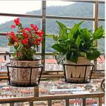 China Black Single Tier Metal Flower Pot Stand , 18x22x12cm Single Tier Plant Stand for sale