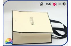 China Brown Folding Paper Shopping Bags Matte Lamination With Ribbon Handle supplier