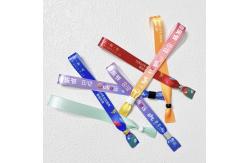 China Supplier Woven Cloth Wristbands Festival Concert Promotion Event Ribbon Fabric With Various Designs supplier