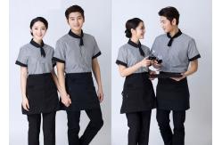 China Embroidered Unique Restaurant Uniforms With Single Row Transparent Resin Buttons supplier