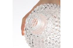 China Unique Buddha Head Shaped Glass Bottles with Aluminum Plastic PP Collar Material supplier