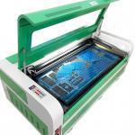 DAQIN 40x100cm CO2 Laser Tube Engraving And Cutting Machine High Accuracy for sale