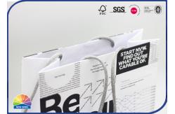 China Custom Print Paper Shopping Bags With Cotton Ropes For Clothes supplier